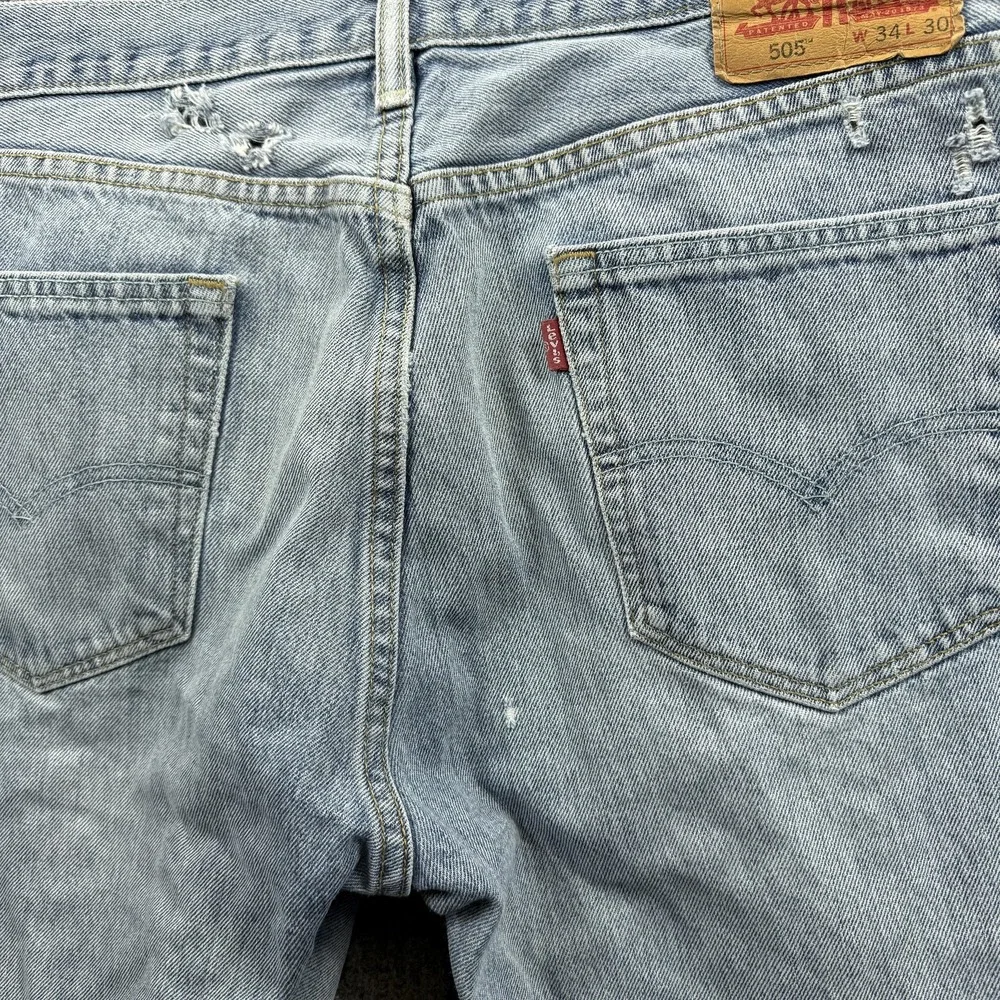 Levis 505 Jeans Mens 34x29 Light Wash Blue‎ Straight Leg Denim Distressed Casual